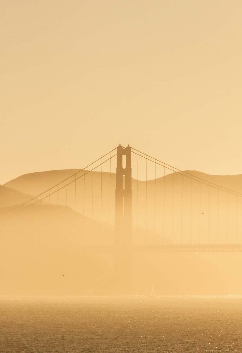 california golden gate bridge covered with fog desert